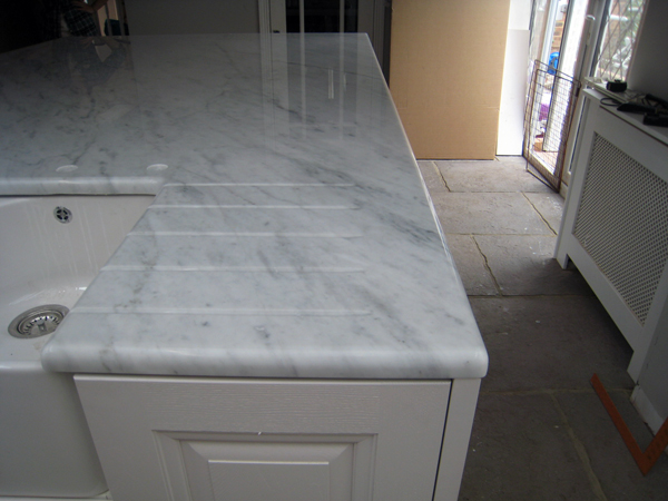 Carrara Marble kitchen island in Epsom