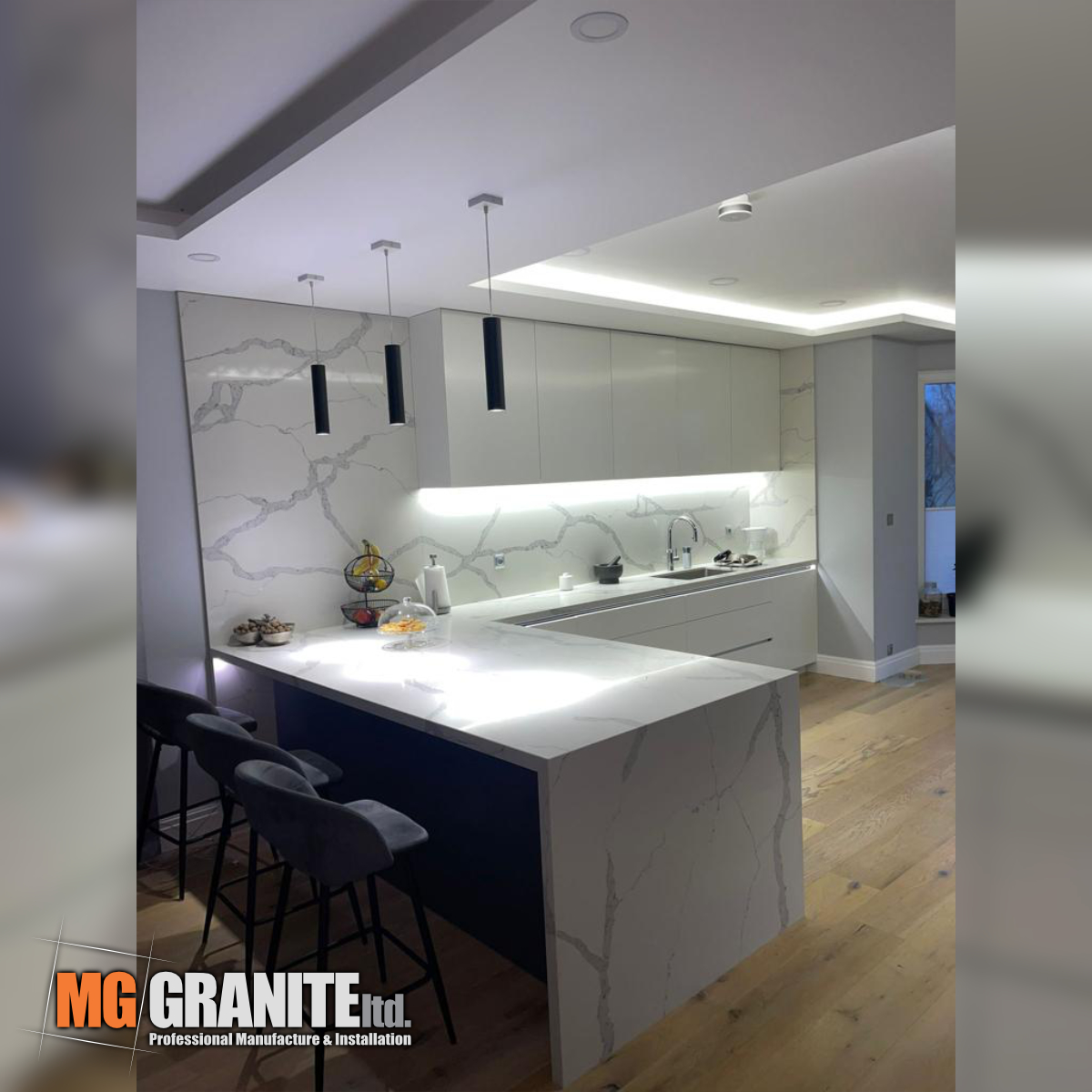 White Quartz with grey veins worktops - full kitchen