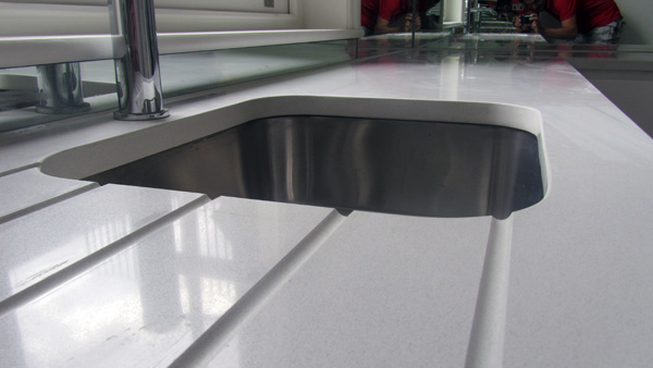 Quartz kitchen worktops and mirror glass splashbacks Fulham