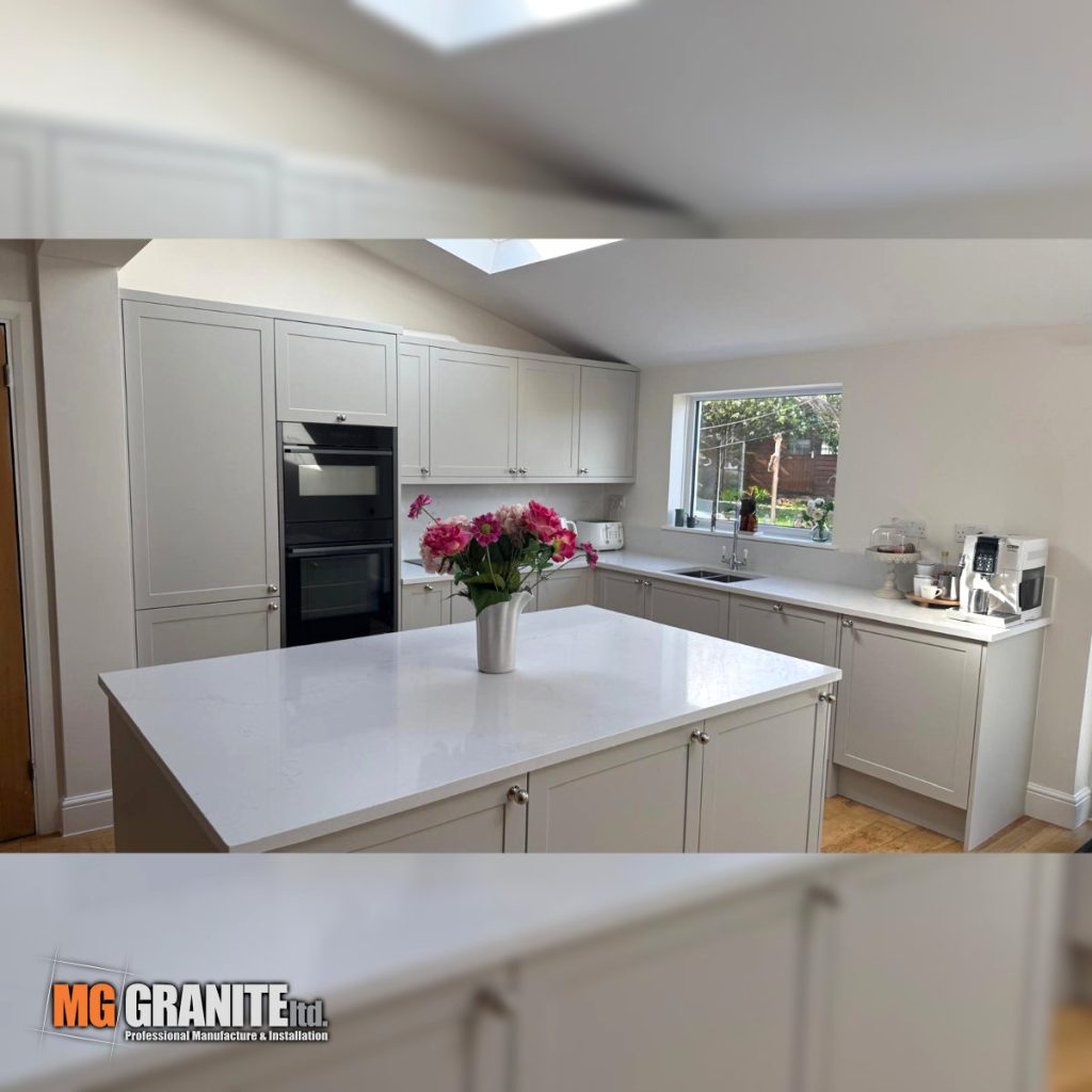 Large full-height matching quartz splashback installed behind the hob area using 30mm Classic Quartz Mystery stone.
