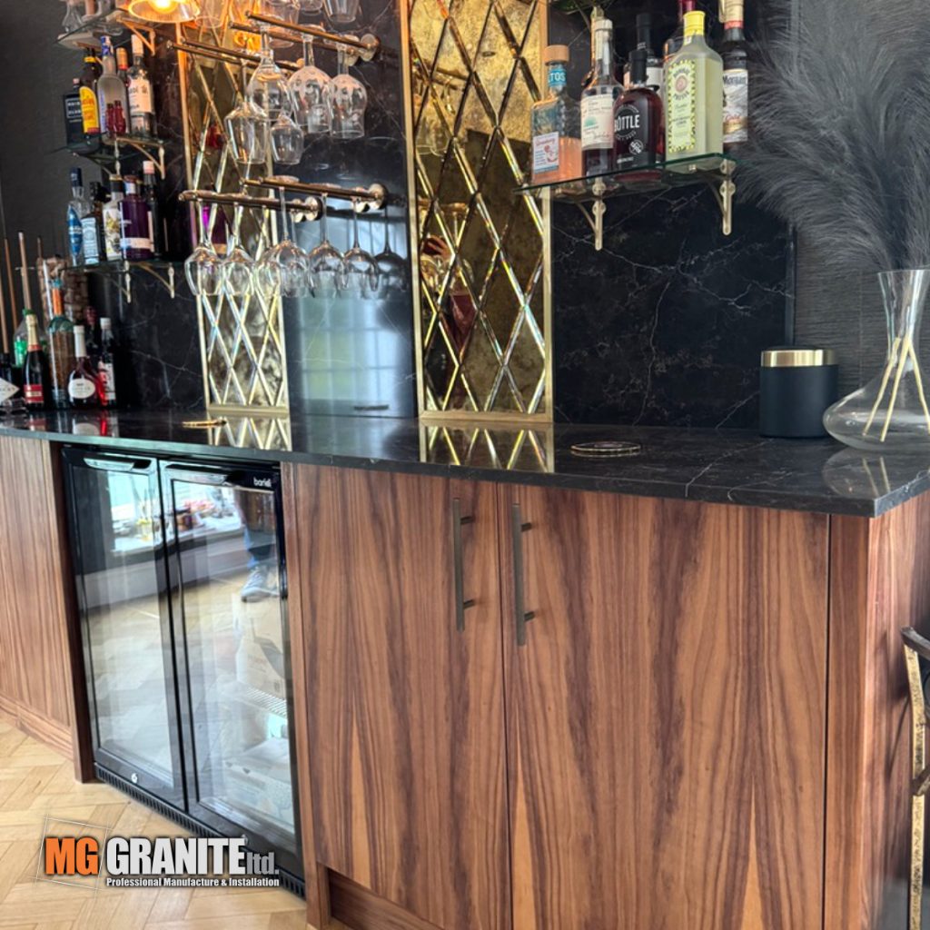 Top-down view of the textured Planet Earth quartz surface on a home bar.